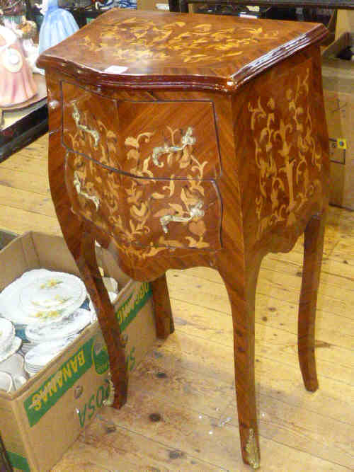 Pair of continental inlaid two drawer serpentine front chests