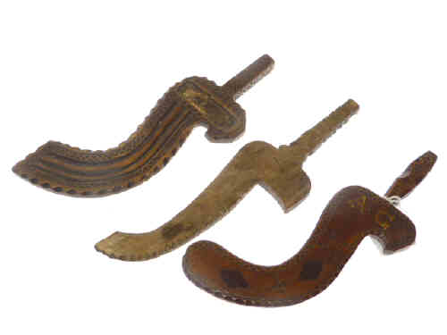 Three carved wood knitting sheaf's
