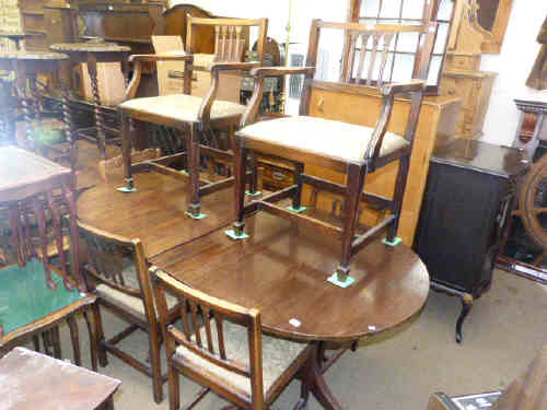 Rackstraw mahogany twin pedestal dining table and six chairs