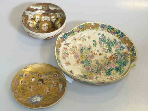 Two Japanese pottery dishes decorated with foxes, and lotus leaf shaped flower decorated dish (3)