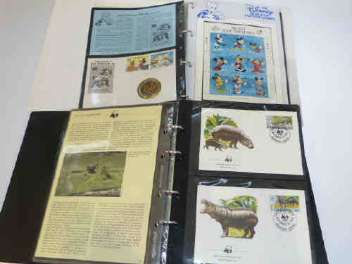 Album with slip case of World Wide Fund for Nature first day covers and album of Disney World