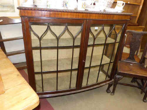 1920's Mahogany two door china cabinet, two Victorian side chairs and gilt framed overmantel mirror