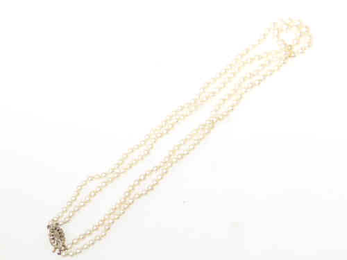 Cultured pearl two-strand necklace with a small diamond