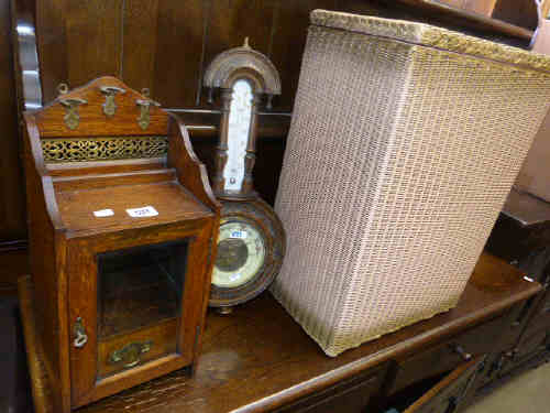 Lloyd loom lusty linen bin, oak smokers cabinet and barometer