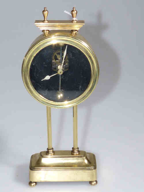 Brass cased gravity clock