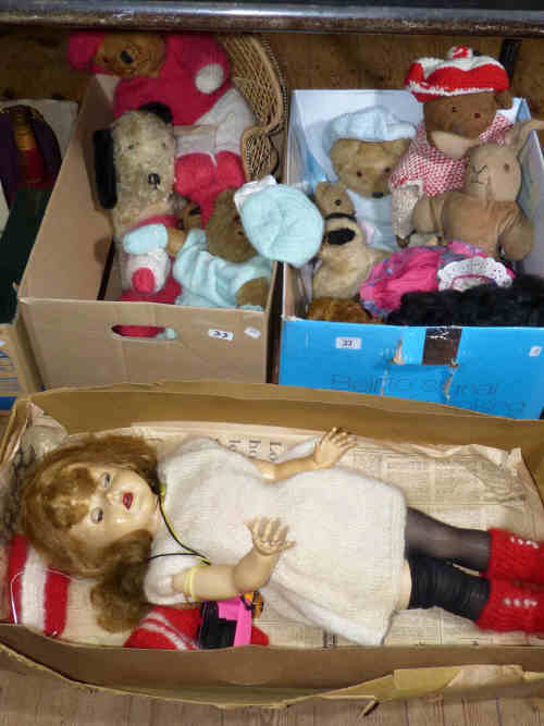 Two boxes of vintage teddy bears and a battery operated doll etc