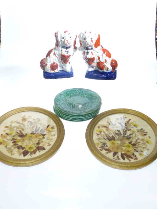 Six green Wedgwood plates, pair of Staffordshire dogs and a pair of oval floral pictures