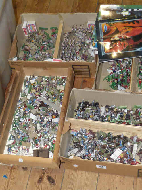 A large collection of toy soldiers etc