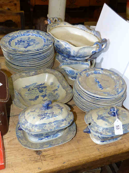 A collection of thirty seven pieces of 19th century blue and white plates, two tureens, sauce boat