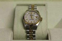 A Lady's bi-metal Rolex watch, with diamond studded dial.   CONDITION REPORT:  Good condition, no