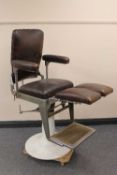 An early twentieth century chrome adjustable dentist's chair.   CONDITION REPORT:  Good time aged