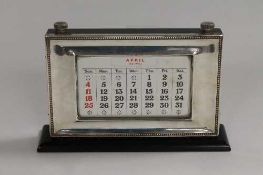 A silver mounted desk calendar, London 1995, width 21.5 cm.    CONDITION REPORT:  Good condition,