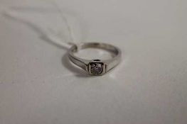An 18ct white gold diamond solitaire ring.   CONDITION REPORT:  Good condition.