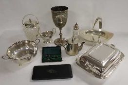 A collection of silver plated items including cut-glass biscuit barrel, trophy, basket etc.