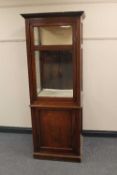 An Edwardian mahogany display cabinet, height 185 cm.   CONDITION REPORT:  Good time aged condition,