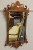 An early twentieth century Chippendale style mirror, 46 cm x 27 cm.   CONDITION REPORT:  Good