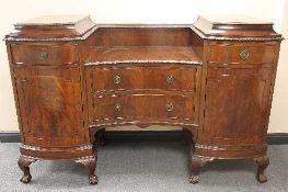 An early twentieth century mahogany pedestal sideboard, width 185 cm.   CONDITION REPORT:  The top