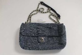 A Chanel denim hand bag, with authenticity card no. 16067464.   CONDITION REPORT:  Good condition.