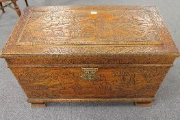 An early twentieth century carved blanket chest, width 92 cm.