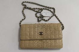 A Chanel cream leather skin hand bag, authenticity card no. 9116611.   CONDITION REPORT:  Good