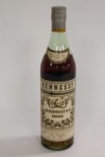 One bottle of early twentieth century Hennessy three star cognac, height 30 cm.   CONDITION REPORT: