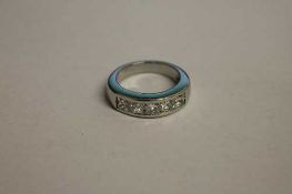 A platinum five stone diamond half eternity ring.   CONDITION REPORT:  Good condition.