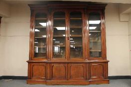 A Victorian mahogany breakfront four door library bookcase, width 252 cm.   CONDITION REPORT: