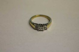 An 18ct gold twelve stone diamond ring.   CONDITION REPORT:  Good condition.