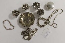 A collection of silver items including four salts, small sugar nips, small dish, chains etc. (Q)