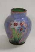 A Royal Doulton tubelined short vase decorated with flowers, height 17.5 cm.   CONDITION REPORT: