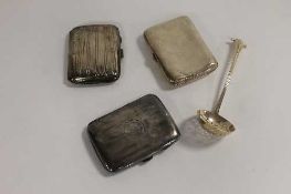 Three silver cigarette cases, together with a silver straining spoon. (4)   CONDITION REPORT: