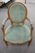 A Continental gilded walnut salon chair, width 62 cm.