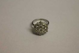 An 18ct white gold diamond cluster ring, approximately 2.5 ct.   CONDITION REPORT:  Good condition.