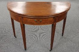 A nineteenth century inlaid mahogany D-shaped tea table, width 105.5 cm.