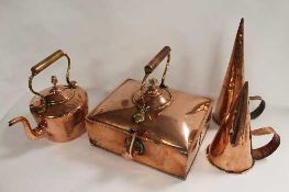A nineteenth century square copper kettle, together with two copper funnels and kettle. (4)