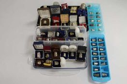 An 18ct two-tone gold thimble, together with a collection of almost sixty other thimbles,