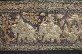 Twentieth century school : An Arabian elaborately embroidered tapestry panel depicting two