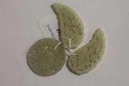 Three Chinese green jade tokens. (3)   CONDITION REPORT:  Good condition, probably twentieth