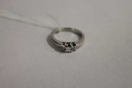 A platinum three stone diamond ring, 0.5ct, colour E/F, clarity Vs2/Si1, with certification.