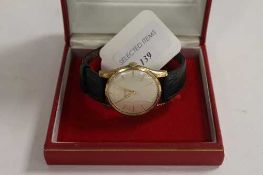 A 9ct gold Gentleman's Omega wrist watch, boxed with original paperwork.   CONDITION REPORT:  Good