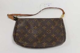 A Louis Vuitton clutch bag, with retail pouch.   CONDITION REPORT:  Good condition.