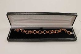A 9ct gold circular link bracelet, 10.7g.   CONDITION REPORT:  Good condition.