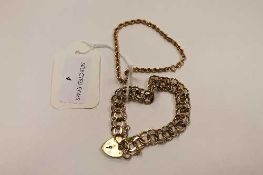 A 9ct gold double chain link bracelet with heart clasp, 18.6g, together with a small rope-twist