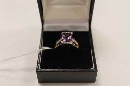 A 9ct gold amethyst and diamond ring, 4.1g.   CONDITION REPORT:  Good condition.