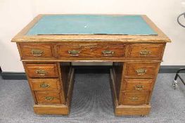 A late Victorian oak pedestal desk, width 107 cm.   CONDITION REPORT:  Fair time aged condition,