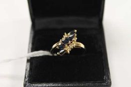 A diamond and sapphire ring.   CONDITION REPORT:  Good condition, mounted in yellow metal, hallmarks
