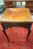 A Victorian mahogany envelope card table, width 55 cm.   CONDITION REPORT:  Good condition.