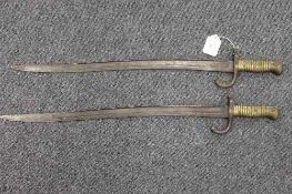 A pair of nineteenth century chassepot bayonets. (2)   CONDITION REPORT:  Time aged condition with