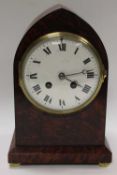 A nineteenth century burr walnut mantle clock, on brass bun feet, height 25.5 cm.   CONDITION