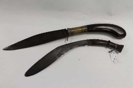 A nineteenth century pioneer's Kukri, together with a military issue Kukri of the same era. (2)